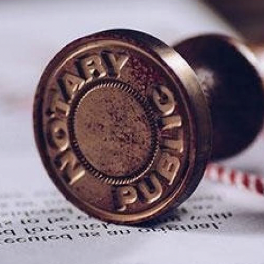 A close up of the wax seal on an old book